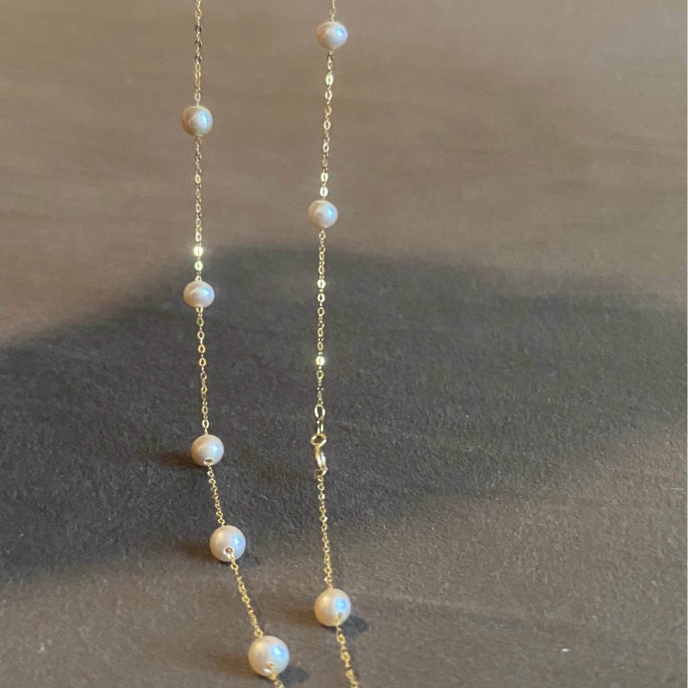 18karat 100% gold with pearl (tangled)